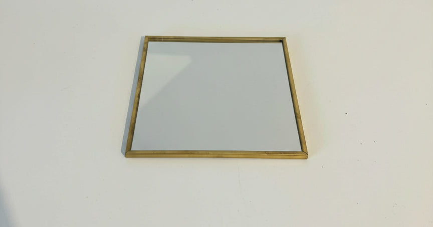 Miroir carré doré